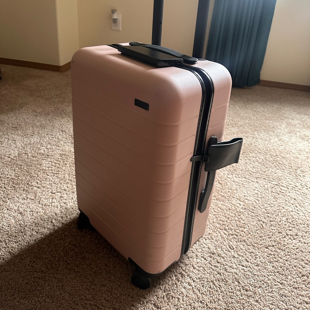 Away Carry On Luggage in Pink